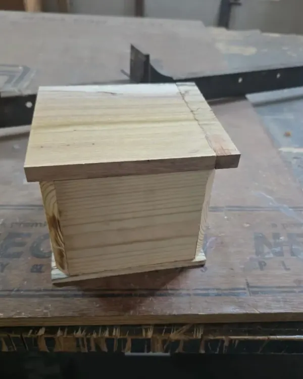 This simple box, made without any nails or screws, is a perfect exercise in precision. The lid was cut from the main body on a bandsaw after glue-up, creating a perfectly seamless fit.