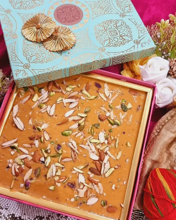 My signature Besan Block, made with pure desi ghee and loaded with premium almonds and pistachios. This was part of a special Rakshabandhan order, packed in a beautiful turquoise box, ready to be gifted with love.
