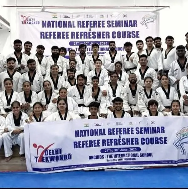A group photo with all the black belt participants at the IT Taekwondo National Referee Seminar in 2025.