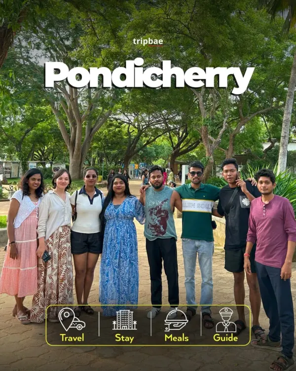 A group of travelers enjoying the pleasant weather in Pondicherry. Our trips to the French Riviera of the East include exploring the charming streets, beaches, and cafes.