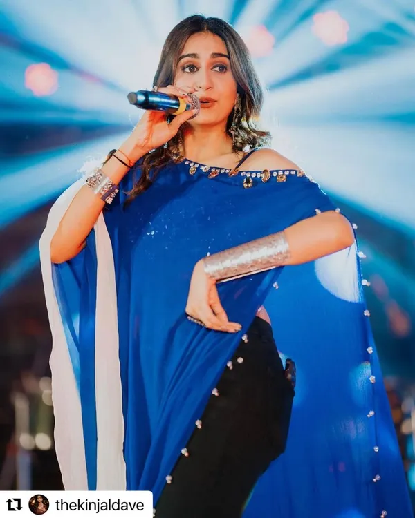 The amazing Kinjal Dave owning the stage. I styled her in our oxidized silver arm cuffs and a statement choker to match her powerful performance vibe.