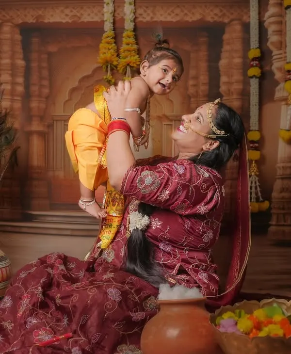I believe in capturing the magic in everyday moments. For this mother and child portrait, we created a divine Krishna-themed setup in my studio, turning a simple photoshoot into a cherished memory filled with love and innocence.