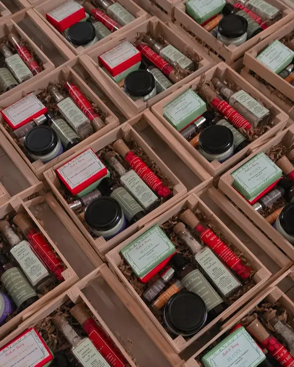 A look inside one of my most comprehensive bulk gift hamper orders. Each wooden crate was filled with a complete skincare routine, including two types of handmade soaps, a rich body butter, coffee-infused undereye roll-on, nourishing lip balm, and more.