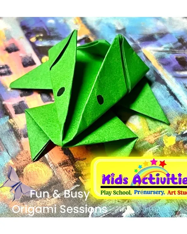 Unfold creativity with paper. This origami frog was made during one of our fun and busy Origami Sessions. This activity is a fantastic way for kids to improve concentration, learn to follow instructions, and create something magical from a simple sheet of paper.