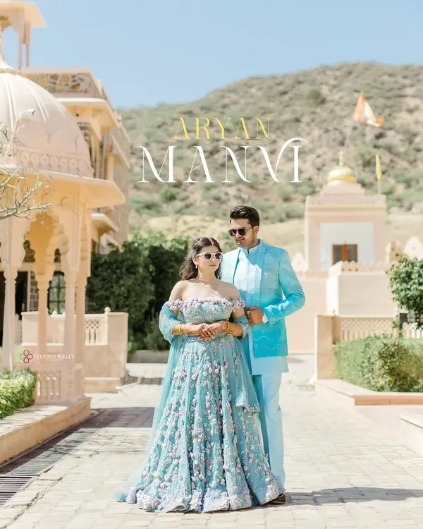 Capturing the essence of a royal romance in Pushkar, Rajasthan. The grandeur of the palace architecture perfectly complements the couple's elegant, color-coordinated attire for a timeless pre-wedding portrait.