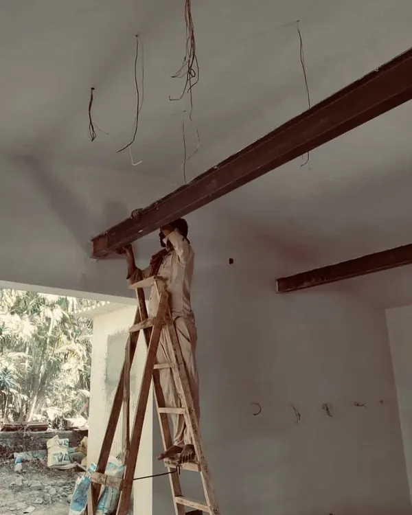 The dedication of construction workers is imperative for a high-quality finish. They work tirelessly to bring our ideas to life, and this image captures a moment of that hard work during the interior fit-out of a villa project.