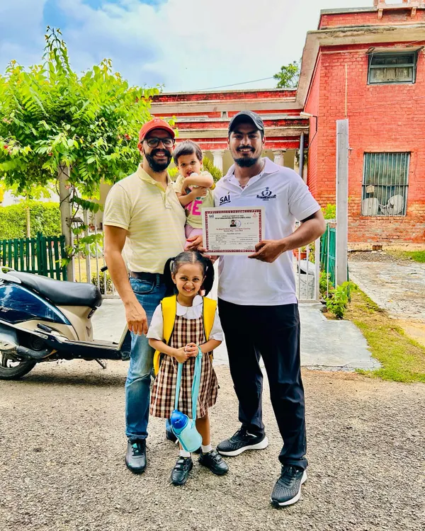 With my family after receiving my coaching certificate from NIS Patiala. This certification represents my professional commitment to the science of sports training.