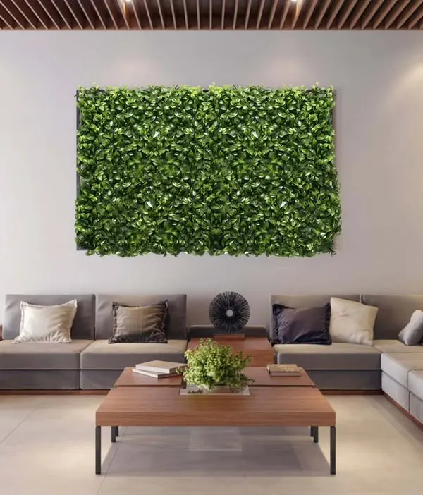 A great example of how a green wall can elevate a commercial space. For this modern lobby, I installed two distinct artificial gardens to add a touch of nature and sophistication where clients and visitors gather.