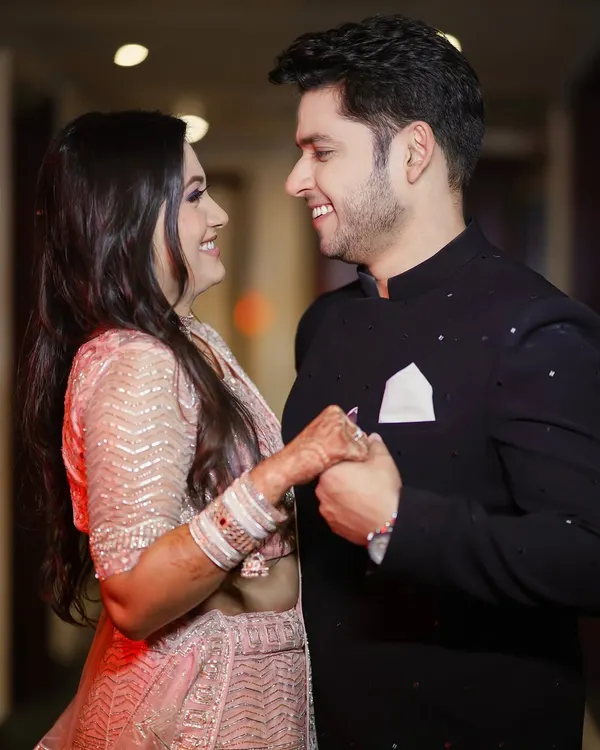 The best moments are the unposed ones. Here, a shared laugh between the couple during their engagement shoot shows their genuine connection and happiness, which is exactly what we love to capture.