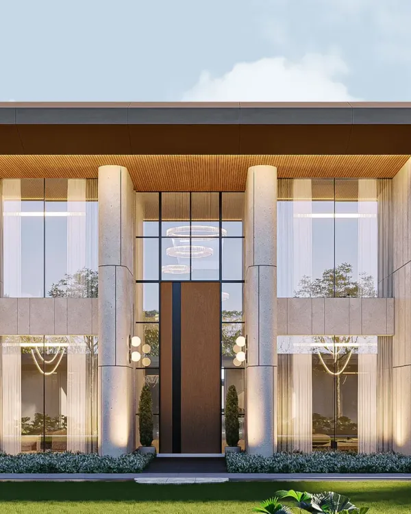 This facade balances monumental strength with serene openness. The design uses verticality, softened by transparent glass and layered with warm lighting, to create a sense of grounded elegance and a welcoming presence.