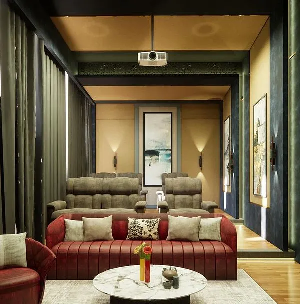 A classical home theatre in "Yash Villa," featuring tiered seating with plush recliners and a sofa, all set within a richly textured room.