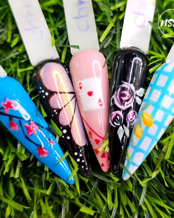 I am so proud to display this collection of designs from our students. It shows their mastery of different techniques, including hand-painting cherry blossoms, butterflies, playing cards, and checkered patterns.