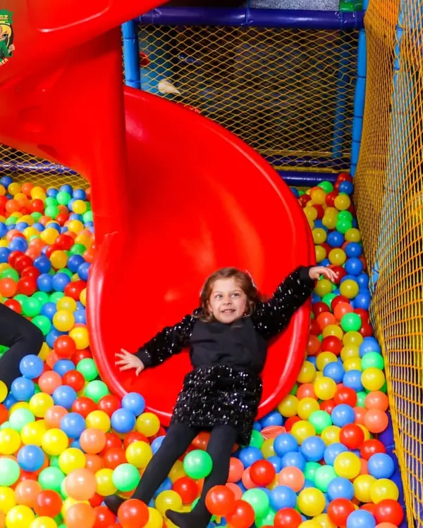 This is the heart of our play zone. The spiral slide and deep ball pit provide hours of safe and active fun for children, making it a highlight of any party or playdate.