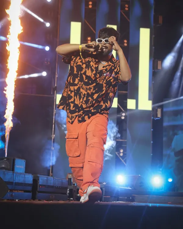 This is the moment I live for. Capturing the raw energy of KhullarG from Hustle 2.0 as the pyro goes off and the crowd just loses it. This is high-energy event coverage at its finest.