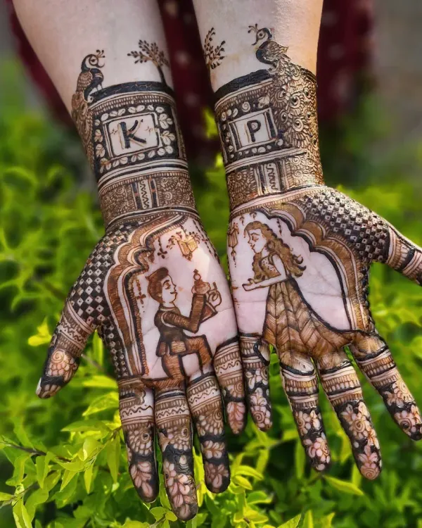 I love bringing your stories to life through henna. For this engagement mehendi, we created a beautiful scene of the proposal, complete with the couple's initials 'K' and 'P' framed by elegant peacocks.