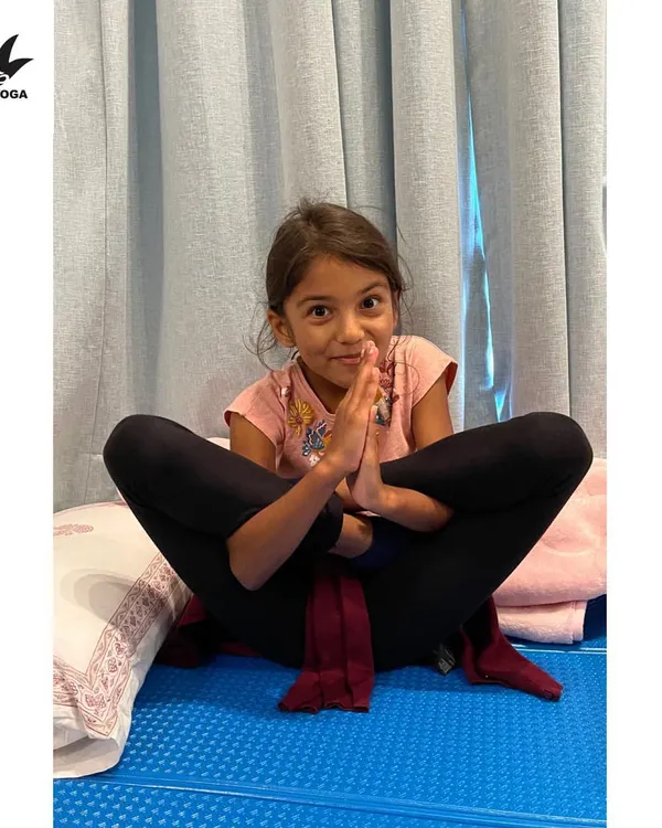 It is so rewarding to see my students progress. Here is my wonderful student Asha mastering Kukutasana, an advanced arm-balancing pose. We build up to these moments with consistent practice, focusing on strength and patience.