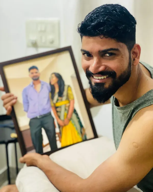 A happy client with his custom couple's portrait. His smile says it all. It's moments like these that make my work so fulfilling.