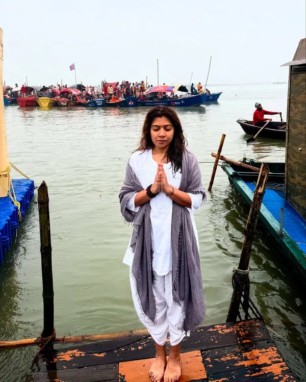 A moment of prayer at the Mahakumbh, standing at the confluence of sacred rivers. The desire for liberation and the feeling of divine love is palpable in such a powerful place.