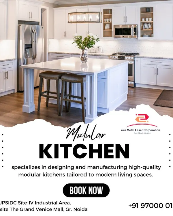 A stunning, all-white modern modular kitchen with a large central island that doubles as a breakfast bar. This design exemplifies luxury and functionality, with ample cabinet space and a clean, bright aesthetic.