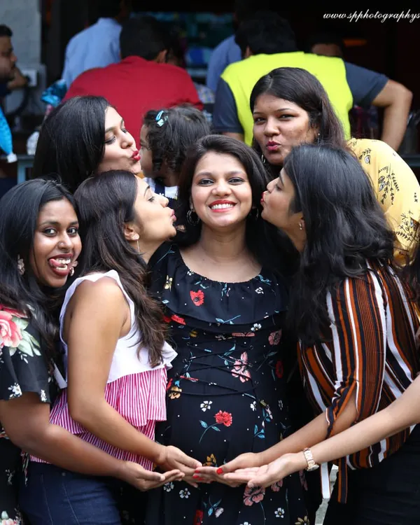 A baby shower is a joyous celebration with friends and family. We capture the fun, candid moments like this one, preserving the memory of the love and support surrounding you.