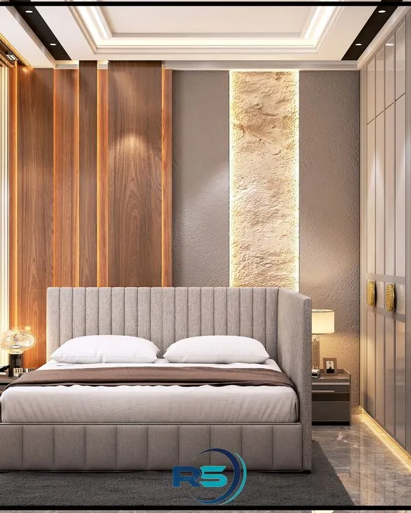This 3D render shows a bedroom design focused on rich textures. We combined a vertically paneled upholstered headboard with contrasting wood and stone-textured wall panels to create a warm and inviting atmosphere.