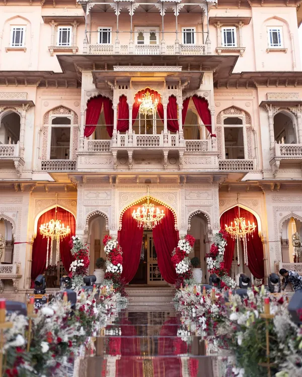 The grandeur of Chomu Palace provided the perfect canvas for this iconic wedding evening. I used rich red drapery and magnificent chandeliers to accentuate the palace's heritage architecture, creating an atmosphere of pure royal elegance.