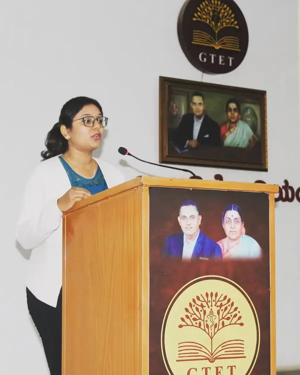 Speaking at an awareness program for young adults about acne and hair loss. It's crucial to educate them on basic care and the importance of seeking early treatment.