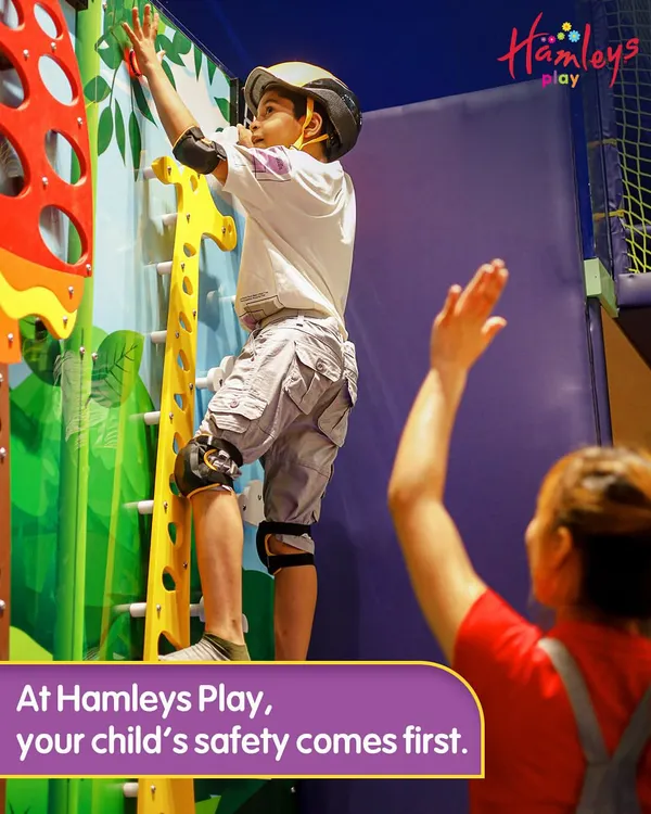 At Hamleys Play, your child's safety always comes first. A Play Pal spots a young climber, providing encouragement and ensuring all safety measures are in place. We are always there to support their adventures.