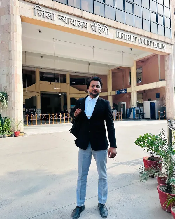 Here I am outside the District Court Rohini. Success in the legal field comes from being dedicated and consistently present where the work happens.