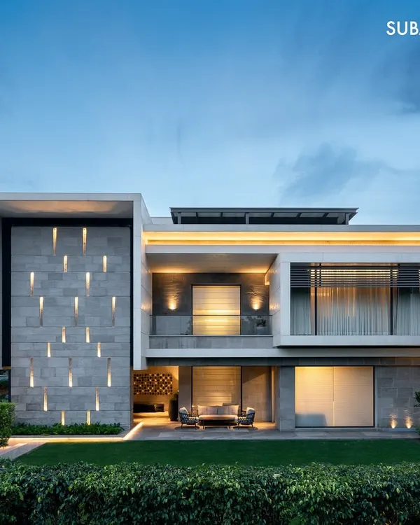 This is Residence 338, a multi-generational home I designed in Chandigarh. The facade comes alive at dusk, with integrated lighting that highlights its strong, rectilinear forms and creates a dramatic visual statement.