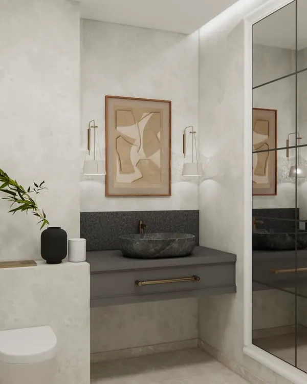 Instead of the usual mirror above the basin, we opted for a bold piece of art to bring character to the space. A large, grid-style mirror was strategically placed on the adjacent wall to open up the room and reflect light, creating the illusion of a much larger, airier bathroom.