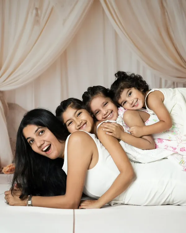 There is nothing like the sukun of a mother's love. This is what it's all about for me, capturing these real, playful moments with your betis piled on, full of laughter. These are the memories you will hold onto forever.