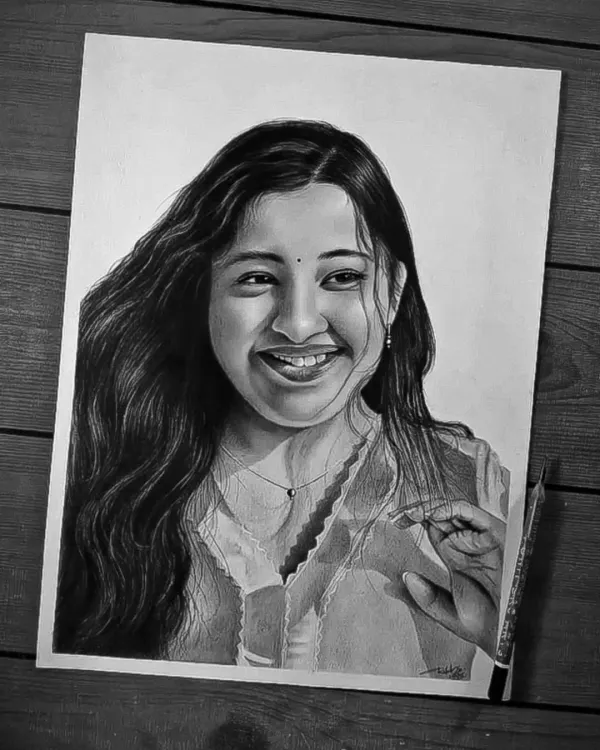 A finished portrait capturing a joyful smile. My goal is to make the drawing feel as warm and real as the memory in the photograph.