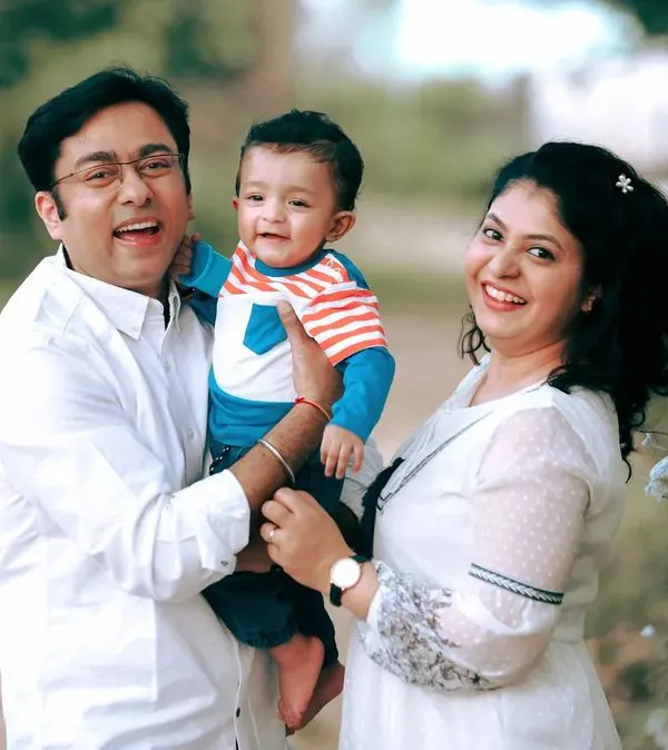 A beautiful family portrait captured during a lifestyle session in a park. The genuine smiles and laughter are what make these outdoor shoots so full of life and energy.