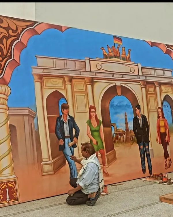 Here I am putting the finishing touches on a large mural for a German Embassy event in New Delhi. The piece blends Indian and German cultural elements.