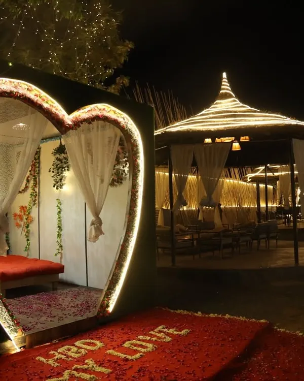 This is the kind of magic I love creating for you. My heart-shaped cabana, lit up for a special night, is perfect for proposals, anniversaries, or just making your favorite person feel loved.