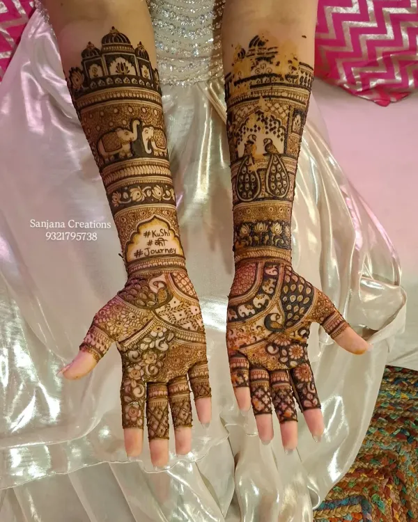 This is what a bride's dream mehndi looks like. We included everything that told her story: portraits of her and her partner, majestic elephants for royalty, and palace architecture inspired by their wedding venue. Every single detail was planned to make her feel like a queen.