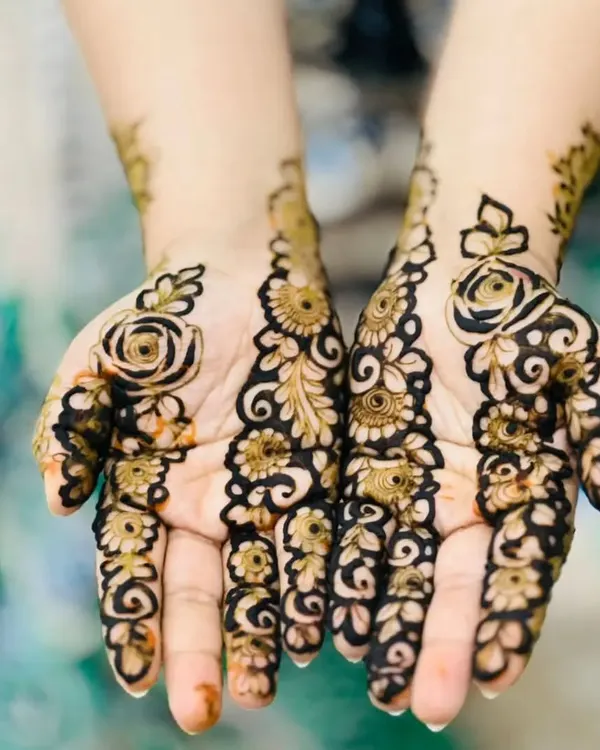 This is my `shiddat wala pyaar` for henna art. I love creating these beautiful, bold floral patterns that feel both traditional and fresh. The delicate shading and clean lines are something I take great pride in.
