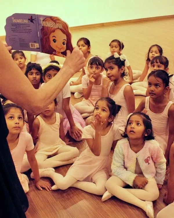 Storytime sparks the imagination before we even take a step. Here, our little dancers are captivated by the tale of Thumbelina, connecting narrative to movement and learning the basics of ballet through play.