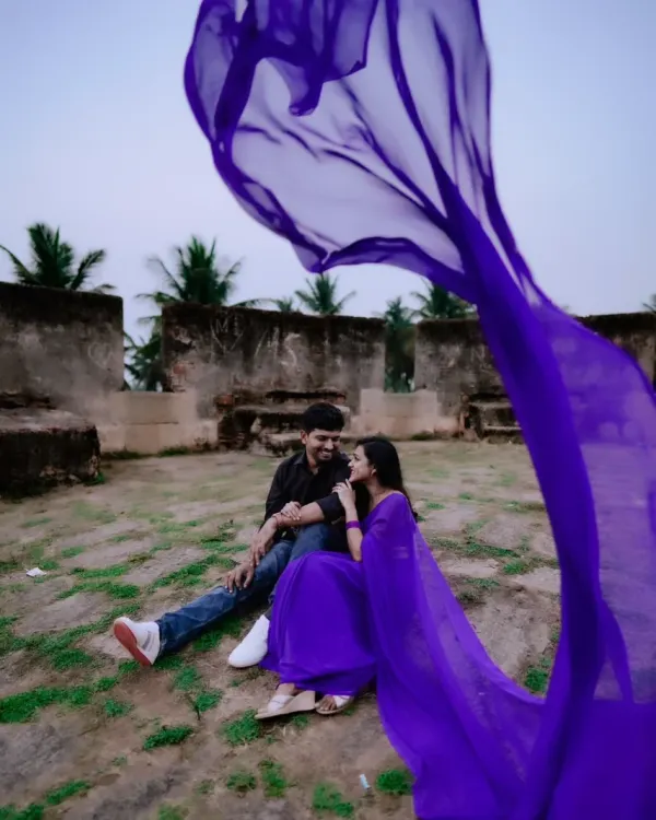 Lost in a purple haze. My signature flying saree adds a magical, flowing element to this romantic couple's shoot.