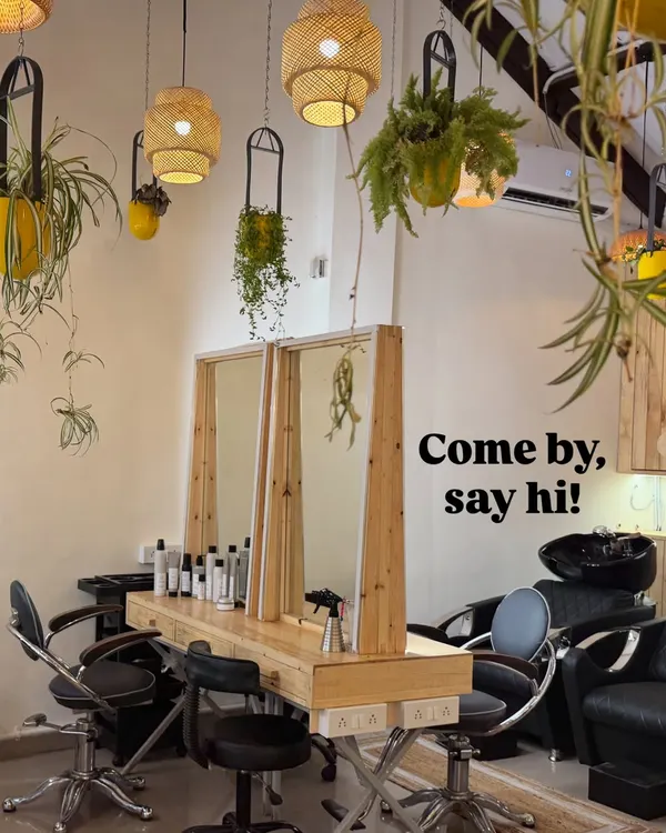 Welcome to Mad O Wot. I wanted to create a space that felt like an escape, filled with plants, natural light, and good energy. Our salon stations are made from reclaimed wood, surrounded by greenery to make your visit as relaxing as possible.