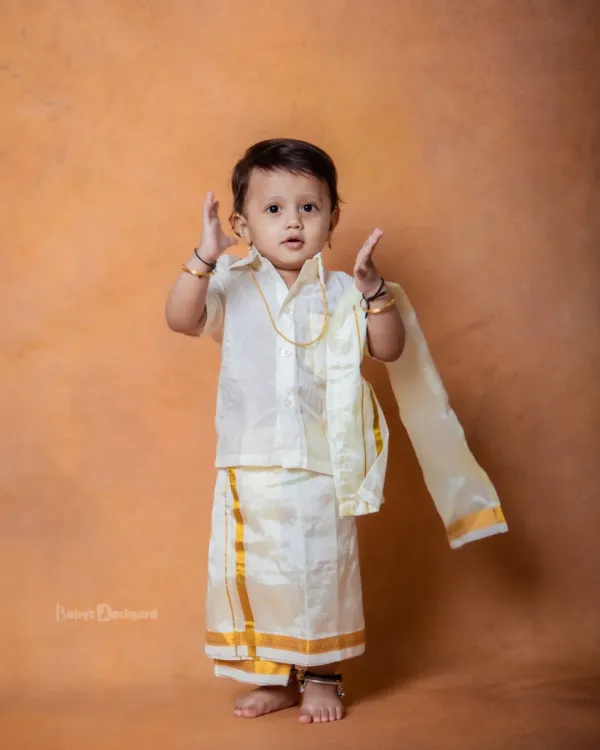 When tradition meets cuteness, you get magic like this. This little one looks so handsome in his traditional veshti.