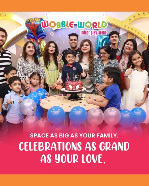 We have plenty of space for the whole family. This photo captures a large group celebrating a Spiderman-themed birthday, showing how we accommodate kids, parents, and grandparents together.