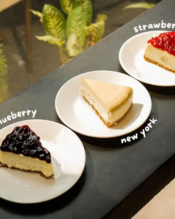 It's a season of cheesy affairs. Here are three of our signature eggless cheesecakes: the tangy Strawberry, the classic Blueberry, and the rich, unadulterated New York style.