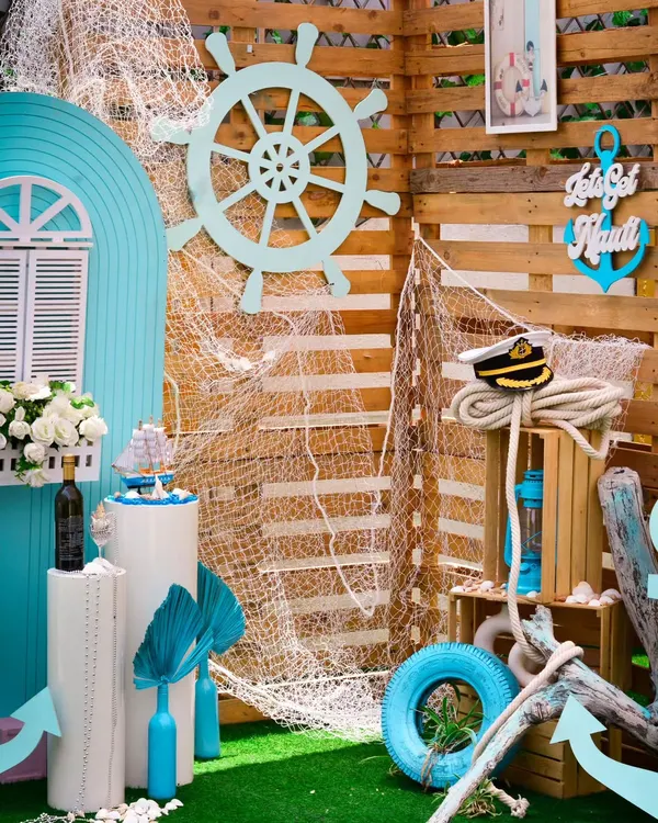 Get "nauti" with a fun nautical-themed party. I used a ship's wheel, fishing nets, anchors, and a cool blue color palette to create a maritime adventure perfect for a birthday or bachelorette.