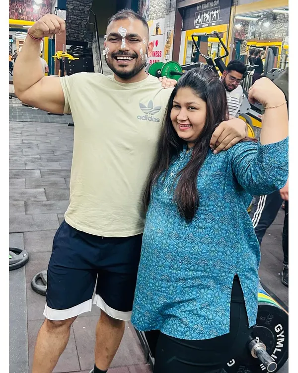 Celebrating my birthday in the best place possible, the gym, with my gym family. The cake on my face is part of the tradition.
