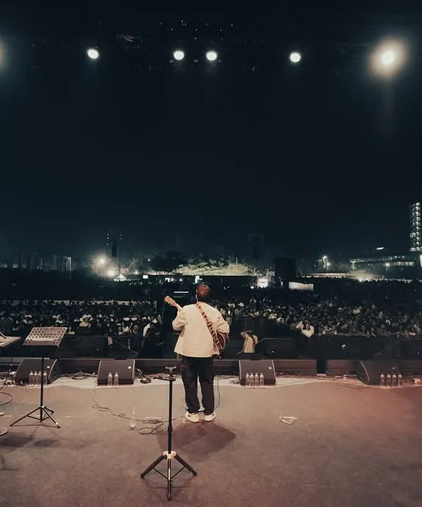 This is what it's all about. Standing on stage with my band, looking out at a sea of faces in Pune. There's no feeling like connecting with a massive crowd through music. This is the energy we bring to every large scale concert and festival.