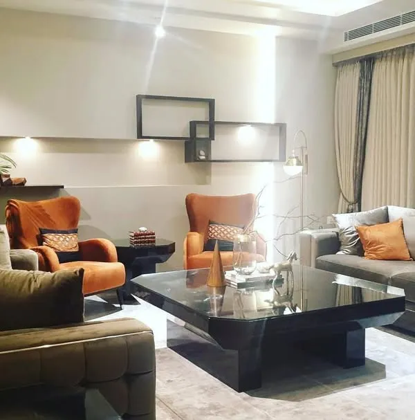This is a living room from a recently completed project in Gurgaon, designed to be a masterpiece of classic comfort and luxury. I focused on creating a warm, inviting atmosphere with plush seating and a rich color palette, ensuring the space is perfect for both relaxing and entertaining.