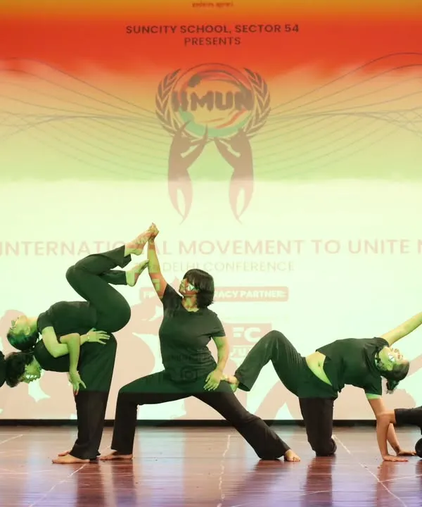 This is movement as storytelling. A powerful moment from our contemporary dance troupe's stage performance at the IIMUN conference, where we created a human structure to represent unity and collective strength.