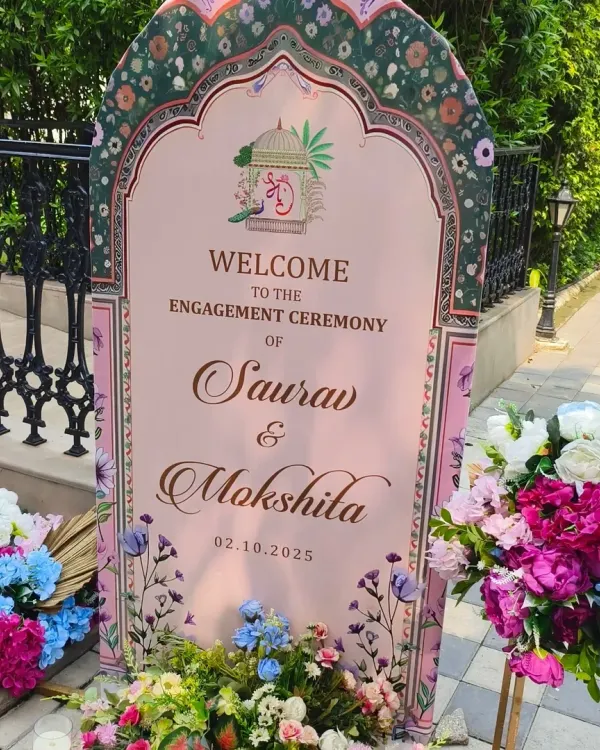 A personalized welcome sign for an engagement ceremony. The design features a beautiful floral border and a custom monogram, giving guests a warm and personal greeting.